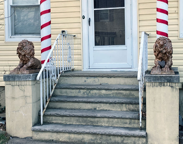 What Do Lion Statues Mean in Front of A House: Why Does Homeowner Choose it